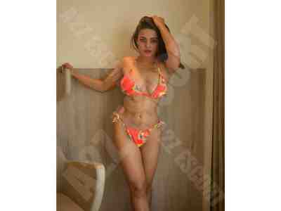 Escort service in Diu with stunning companions, playful brunette escort in Diu enjoying the outdoors