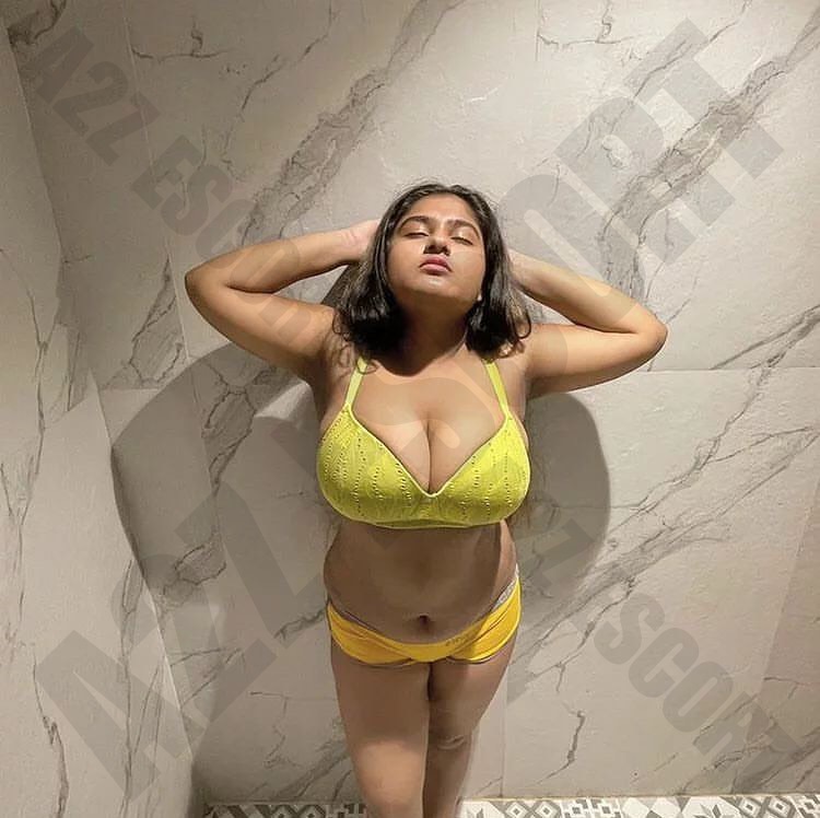 Escort service in Mysore with stunning companions, playful brunette escort in Mysore enjoying the outdoors